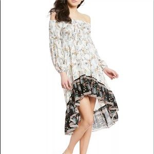 Evolutionary floral high low smocked dress